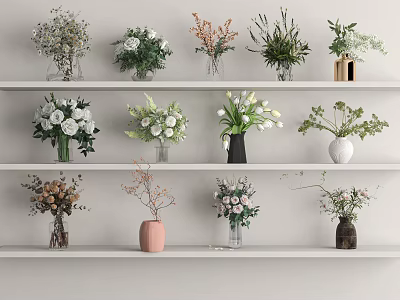 Elegant Decorative Vases With Various Flowers Arranged On White Shelves 3d model