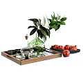 Green Glass Vase with Fresh Flowers and Wooden Tray with Pomegranates and Glass Cups