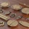 Different Designed Metal Cabinet Handles With Ornate Patterns And Various Shapes