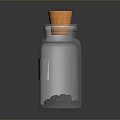 Transparent Glass Bottle With Cork Stopper White Label And Black Granules Inside