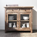 Distressed Wooden Sideboard With Glass Doors White Dishes Vases Jugs And Metal Wire Basket