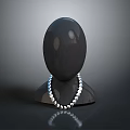 Silver Beaded Necklace Showcased On Black Mannequin Head For Daily Accessory