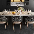 Modern Dining Table Set with Marble Top and Patterned Chairs Centerpiece Flowers in Kitchen Interior