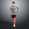 Active Male Runner In Gray T Shirt Black Shorts And White Sneakers