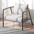 Stylish Accent Chair With Gray Cushion Black Metal Frame And Woven Rope Armrests