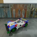 Electric Toy Racing Car With Blue White Red Body And Green Wheels Design