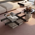 Modern Glass Coffee Table With Cross Design And Decorative Items On Light Living Room Carpet