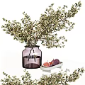 Purple Glass Vase With White Small Flowers Green Branches And Figs On White Tray