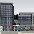 Modern Office Building Complex With Multiple High Rise Structures And Green Plaza