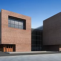 Modern Brick Office Building with Geometric Structure White Roof And Large Glass Windows