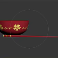Red Bowl With Yellow Interior And Gold Flower Designs Plus Red Chopsticks With Gold Accents