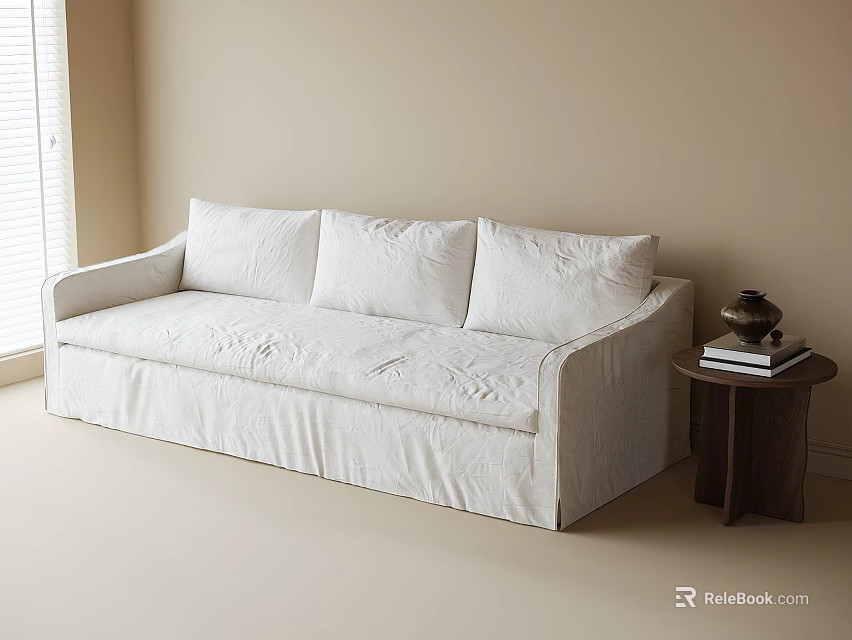 White Sectional Sofa With Wrinkled Slipcover And Wood Side Table Holding Books In Beige Room 3d model 