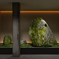 Garden Courtyard Design With Moss Covered Stones Warm Lighting And Concrete Pillar