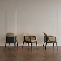 Dining Chairs with Black Frames Beige Woven Seats Light Walls Decorative Moldings Dark Herringbone Floor