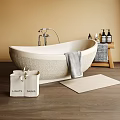 Modern Beige Bathroom Bathtub with Silver Faucet Towel Wooden Stool and Amenity Bottles