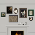 Wall Decor with Various Picture Frames Above White Fireplace with Flames 3d model