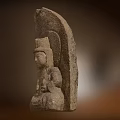 Ancient Stone Buddha Sculpture Carved With Headdress Sitting Posture And Handheld Object