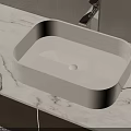 Elegant White Washbasin on Marble Countertop with Modern Chrome Faucet Design