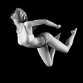 Woman In Yellow And Orange Patterned Swimsuit Performing Aerial Pose With Stretched Arms