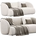 Modern Two Seater Sofa With Beige Fabric Brown Blanket And Decorative Pillows