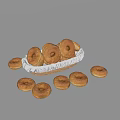 Freshly Baked Golden Brown Donuts in Wicker Basket with Scattered Ones Around