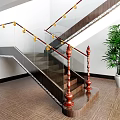 Elegant Staircase With Red Wooden Handrails Glass Balustrades Green Plant And Wooden Flooring