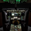 Airplane Cockpit Interior With Illuminated Instrument Panels Control Buttons And Multiple Displays