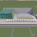 Large Industrial Factory Building Featuring Organized Layout And Colorful Equipment Rows
