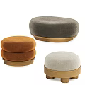 Sofa Stools With Different Colors And Fabric Upholstery On Wooden Bases