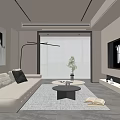Modern Living Room Interior Design With Beige Sofa Floor Lamp Round Coffee Table And Fireplace
