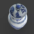 Blue and White Ceramic Vase with Traditional Floral Patterns and Decorative Lid