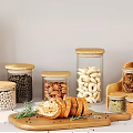 Glass Spice Jars with Wooden Lids and Nuts Bread Slices on White Kitchen Counter