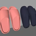 Two Pairs Of Pink And Blue Indoor Non Slip Perforated Slippers Leaning Against White Wall