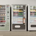 Three Different Colored Refrigerated Vending Machines With Beverages And Snacks Interior