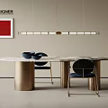 Modern Dining Table Set With Marble Top Brass Legs Black Chairs And Linear Pendant Light