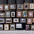 Framed Wall Art Collection With Various Styles Frames Arranged On Dark Wall 3d model