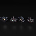 Ornate Decorative Eye Sculptures Arranged In A Row With Intricate Details On Black Background