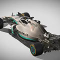 Silver Gray Formula 1 Racing Car With Green Stripes And PETRONAS W11 Design
