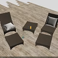 Rattan Lounge Chairs with White Cushions Ottomans and Side Table on Wooden Deck