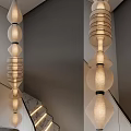 Unique Shaped Chandelier With Layered Fabric Shades For Modern Stairwell Lighting