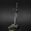 Silver Decorative Sword with Ornate Hilt Embedded in Rock on Dark Background