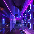 Modern Bar Interior Design With Purple Blue Neon Lights And Sparkling Wall Decor