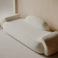 Textured White Single Sofa In Modern Room With Light Colored Walls Wooden Floor And Blinds