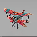 Vintage Biplane Model Airplane With Colorful Red Pink Blue Stripes And Propeller
