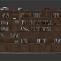 Dark Colored Wooden Bookshelf With Multiple Shelves Filled With Books And Bottom Storage