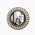 Round Golden Frame Mirror With Intricate Circular Pattern Reflecting Green Plant Shadows