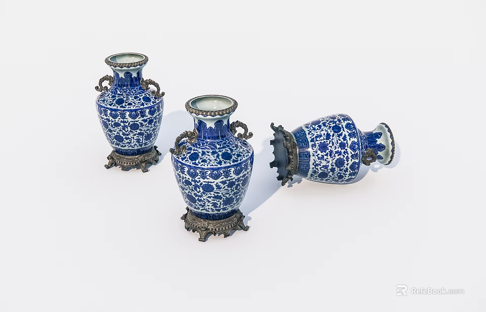 Elegant Blue And White Ceramic Vases With Brass Bases And Intricate Patterns 3d model 