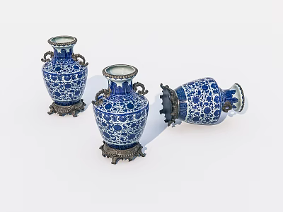 Elegant Blue And White Ceramic Vases With Brass Bases And Intricate Patterns 3d model