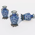 Elegant Blue And White Ceramic Vases With Brass Bases And Intricate Patterns