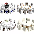 Round Dining Table Sets With Colored Chair Covers And Decorative Flower Arrangements